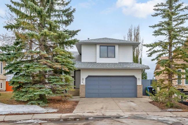 60 Mckenna Manor Se, Home with 2 bedrooms, 2 bathrooms and 4 parking in Calgary AB | Image 1