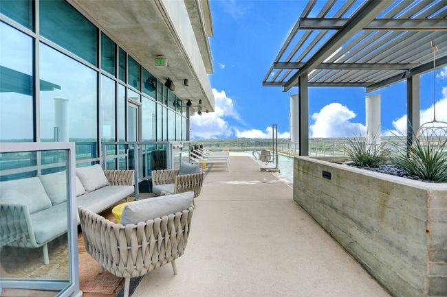 View of patio / terrace with a pergola, a balcony, and an outdoor hangout area | Image 36
