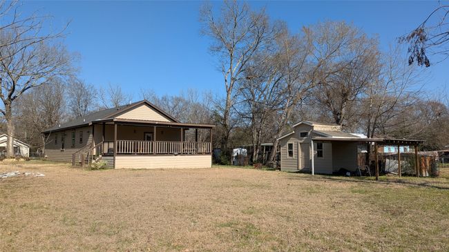 View of yard with a porch | Image 18