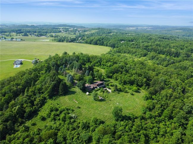 PROBABLY 4-7 ACRES OF LEVEL LAND THAT THE COMPLEX SITS ON OUT OF THE 19.16 ACRES | Image 8