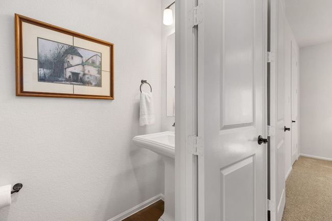 Downstairs power room with toilet and sink | Image 14