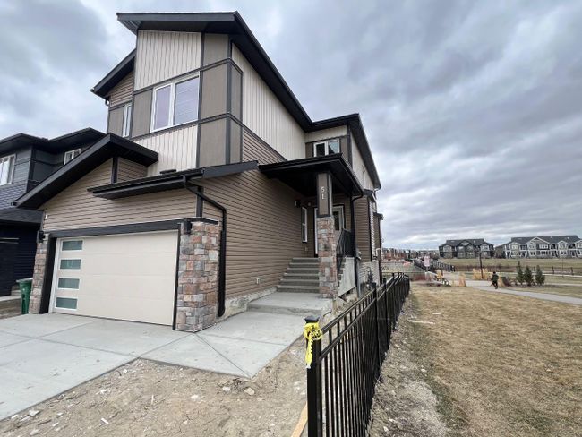 51 Midgrove Drive Sw, Home with 6 bedrooms, 4 bathrooms and 4 parking in Airdrie AB | Image 1