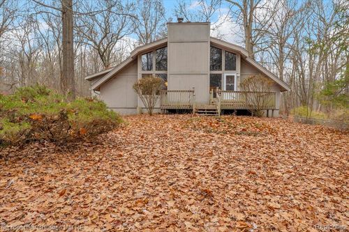 13095 Woodland Trl, Springfld Twp, MI, 48350-3736 | Card Image