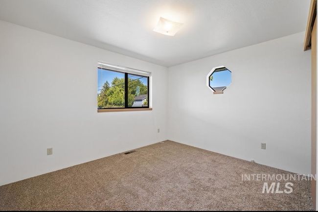 Unfurnished room featuring carpet | Image 17