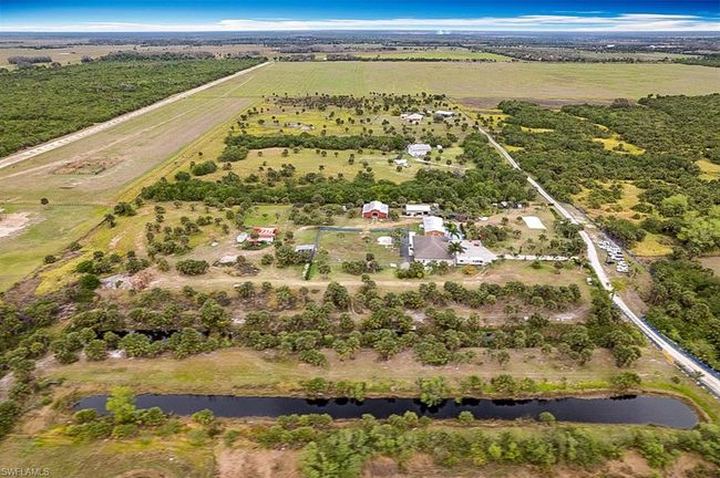 7684 County Rd 78, House other with 5 bedrooms, 6 bathrooms and 5 parking in FORT DENAUD FL | Image 32