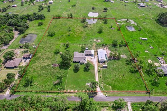 Wow, look at all that space! Perfect for nature and Agriculture enthusiast alike. The 6.42 pasture acreage are currently AG EXEMPT | Image 11