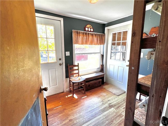 Doorway to outside with wood-type flooring | Image 28