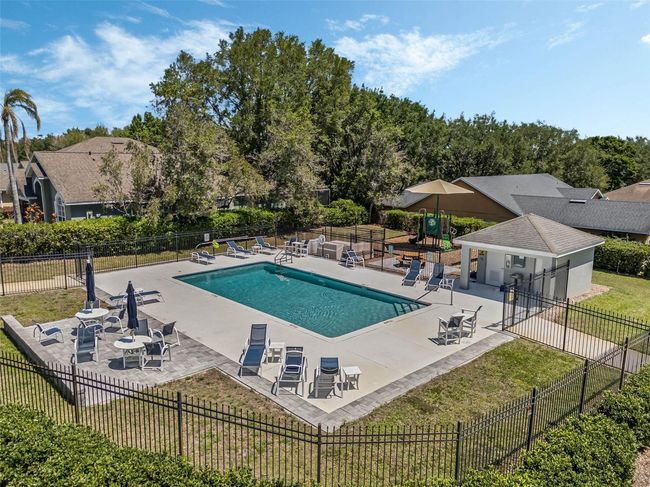 Community Pool has an Adjacent Playground | Image 40