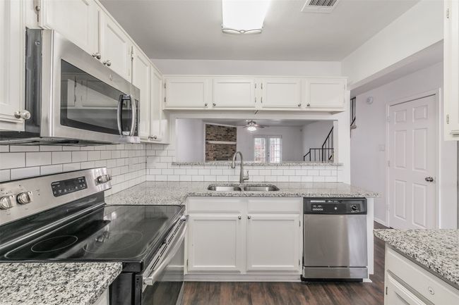 Kitchen featuring stainless steel appliances | Image 13