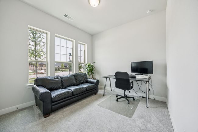 Carpeted home office with baseboards | Image 7