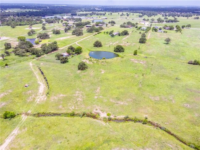View of rural area with a large body of water | Image 9