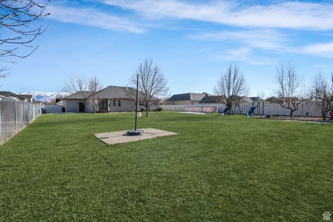 View of yard with a patio area and a fenced backyard | Image 30
