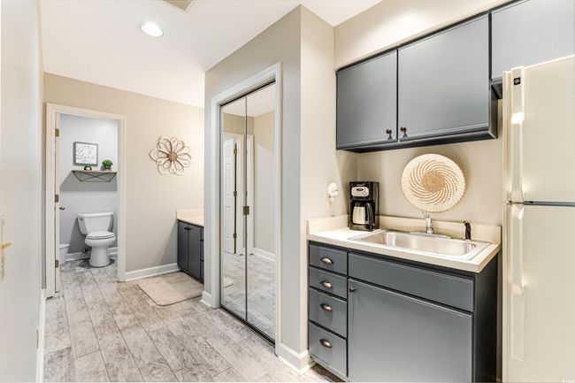 Full bath featuring vanity, baseboards, recessed lighting, toilet, and wood finished floors | Image 18