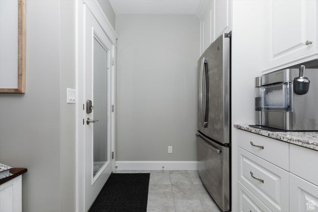Interior space with baseboards | Image 58