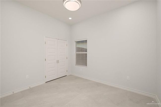 Empty room with baseboards and recessed lighting | Image 14