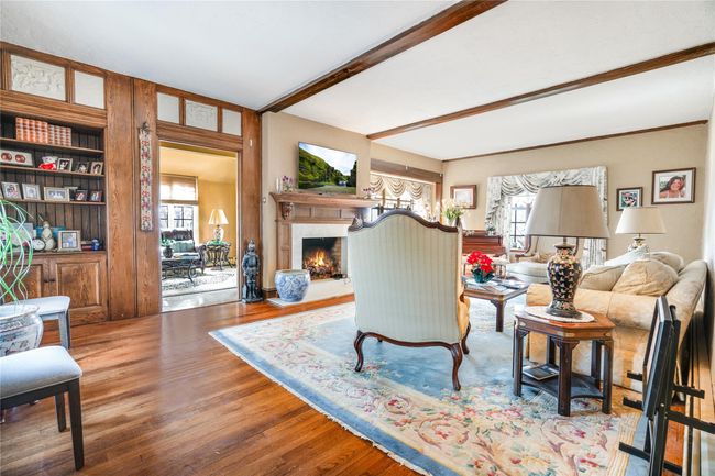 Living area that leads to the sun room | Image 5