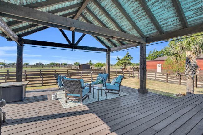 Wooden deck featuring a gazebo | Image 31