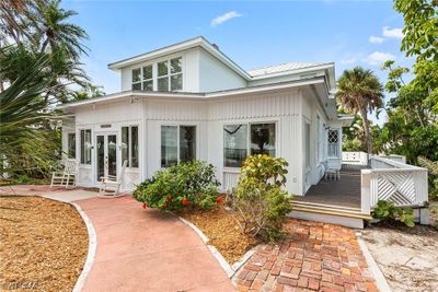 Showing deck leading to the rear of home and back sun deck. | Image 2