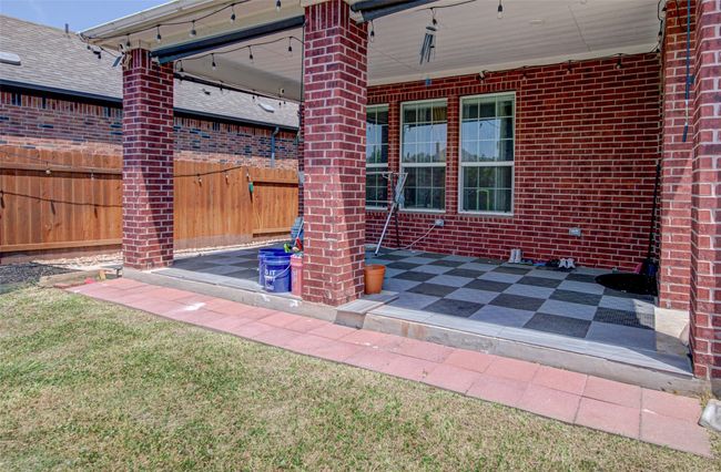 Extended Patio with Tiles Installed, SunShade Installed, Dual Electric Outlets, Natural Gas Connection available | Image 27