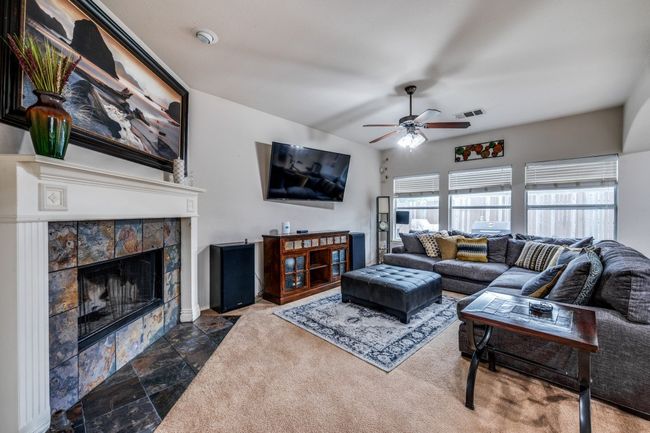 Living area with fireplace | Image 4