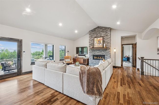 Great Room - Hardwood floors, linear gas fireplace | Image 12