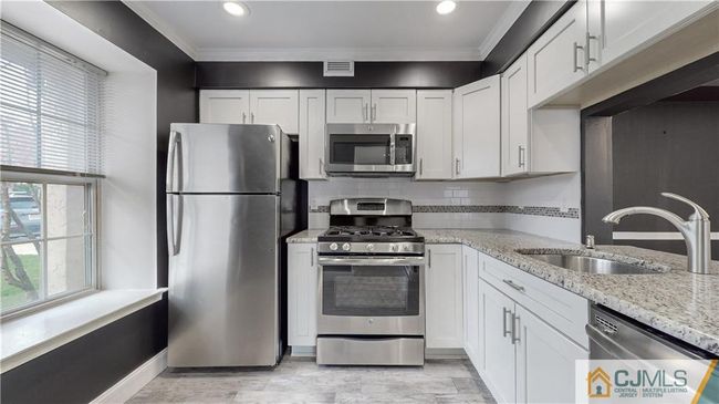 1 - 1401 Commons At Kingswood Dr, Townhouse with 2 bedrooms, 2 bathrooms and null parking in East Brunswick NJ | Image 4