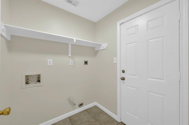 Utility room is in the house. | Image 36