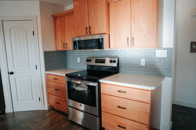 822 28 St, Home with 3 bedrooms, 3 bathrooms and 3 parking in Wainwright AB | Image 42