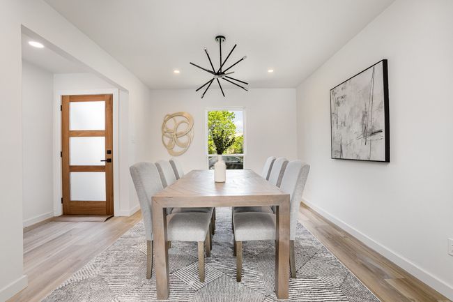 Dining area featuring a chandelier, recessed lighting, baseboards, and light wood-style flooring | Image 6