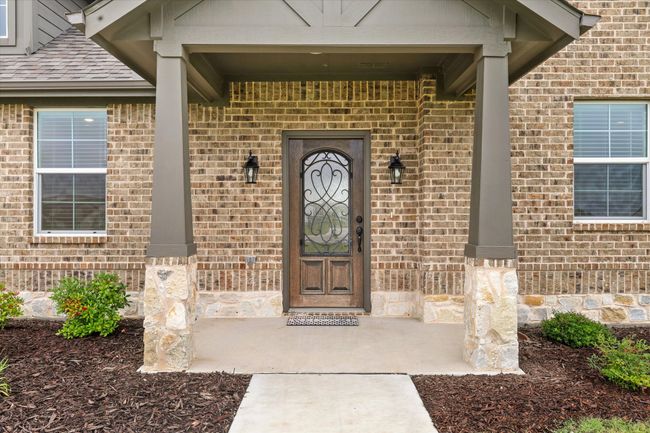 Entrance to property with brick siding | Image 5