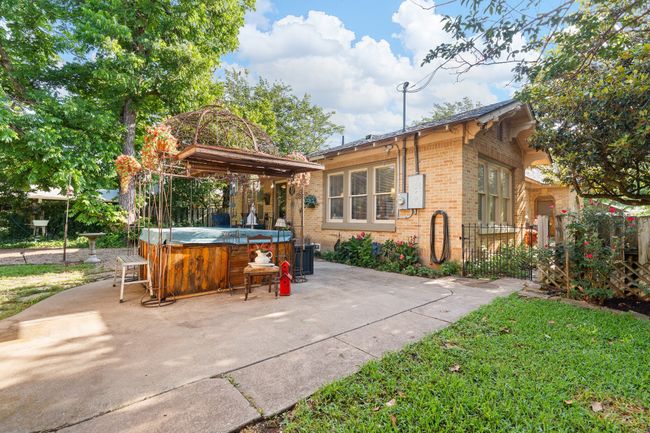 View of patio with a hot tub | Image 32