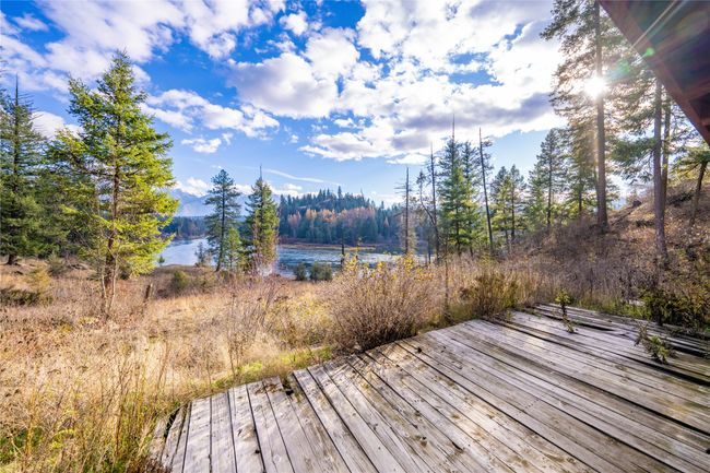 Deck featuring a water view | Image 32