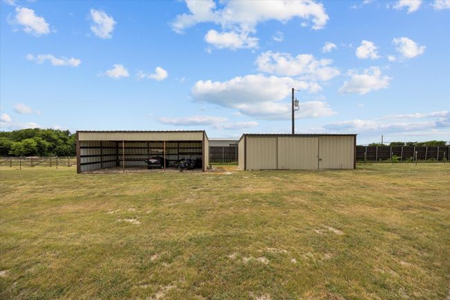 View of pole building featuring a detached carport | Image 18