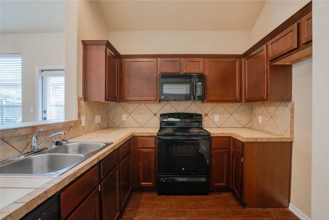 119 Creekside Villa Dr, Home with 3 bedrooms, 2 bathrooms and 2 parking in Kyle TX | Image 10