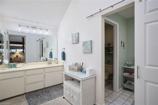Bathroom with vanity, toilet, and tile patterned flooring | Image 15