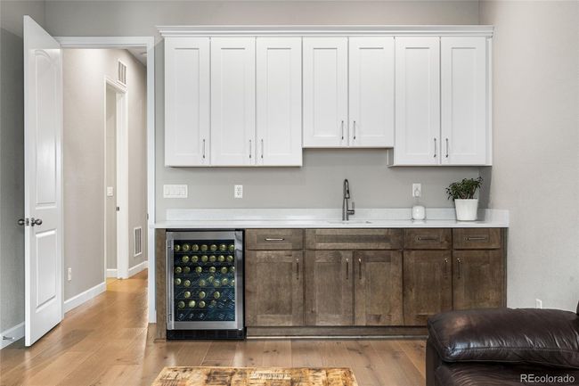 In-law suite private living area with wet bar perfect for guests or multigenerational living | Image 26