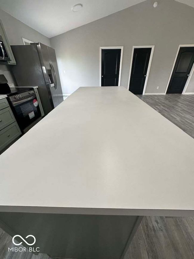 Vaulted Kitchen ceilings w/a large island for all of your entertaining needs! | Image 13
