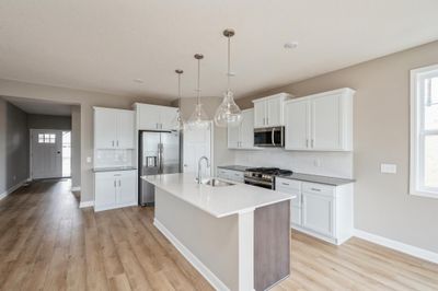 (Photo of similar home, features will vary) Enjoy plenty of seating at the kitchen island. | Image 3