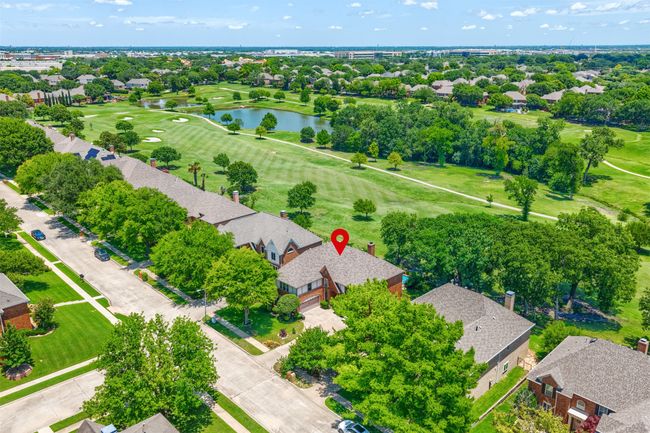 Aerial perspective of suburban area featuring the golf club and lake | Image 38
