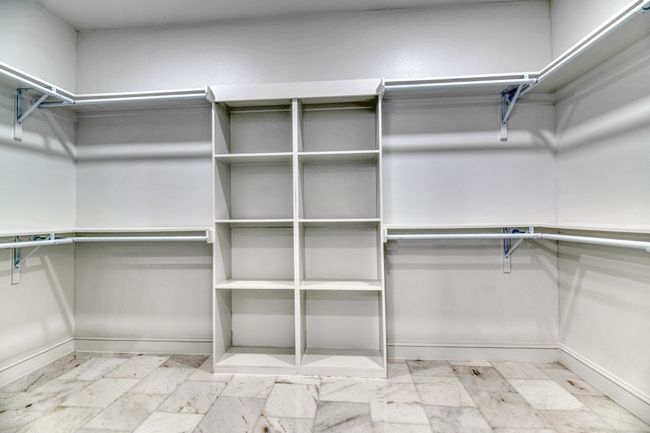View of spacious closet | Image 26