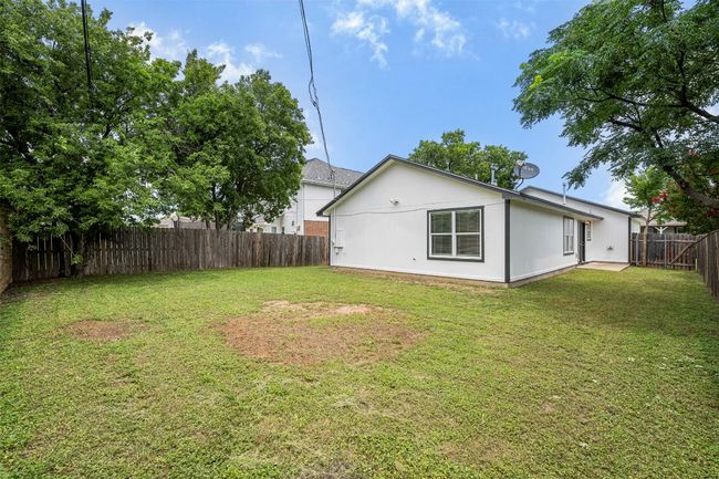 View of fenced backyard | Image 31