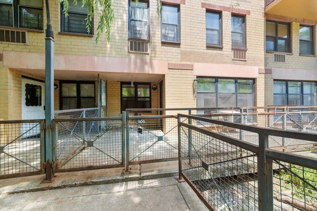 View of front facade featuring brick siding | Image 6