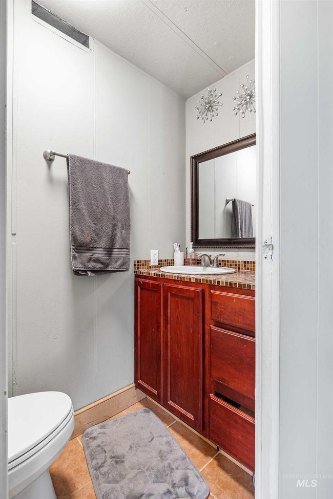 Half bath with vanity and toilet | Image 17