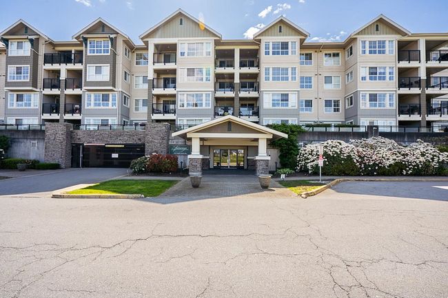 113 - 19673 Meadow Gardens Way, Condo with 2 bedrooms, 2 bathrooms and 2 parking in Pitt Meadows BC | Image 2