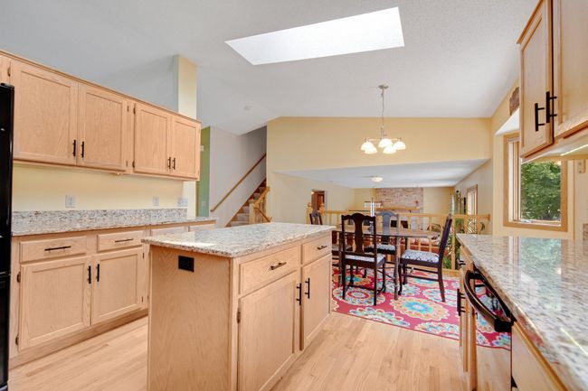 Plentiful counter and cabinet space including pantry with pull-out drawers. | Image 16