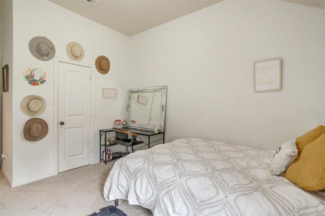 Bedroom featuring carpet floors and baseboards | Image 26
