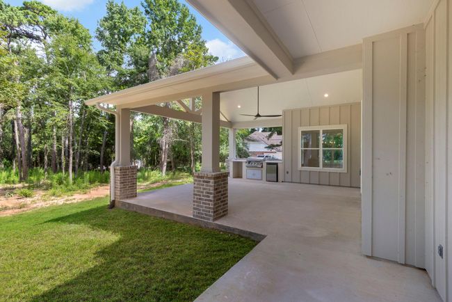 Three separate covered patios off the family room, primary bedroom, and study. | Image 36