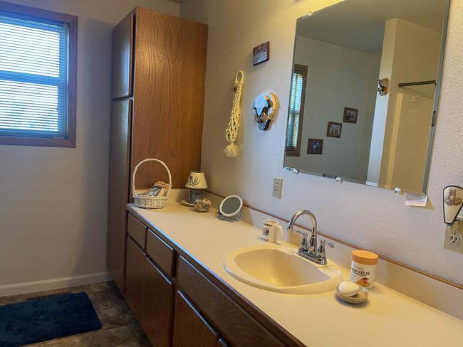 Bathroom featuring vanity and stone finish flooring | Image 12