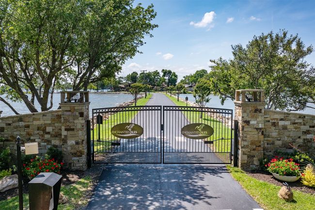 View of front gate entrance into community | Image 7