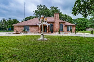 Welcome home to 3040 Woodglenn Dr , Commerce TX | Image 1